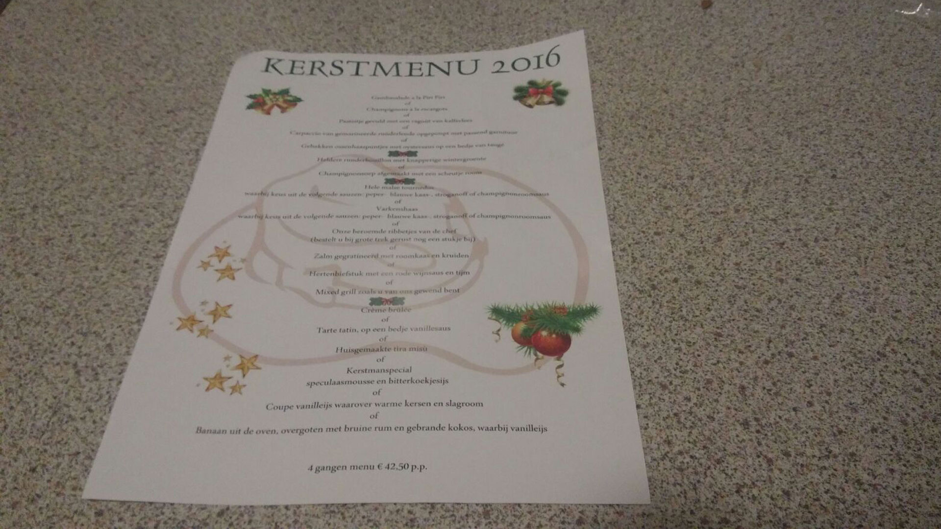 Restaurant vergeet naam op kerstmenufolder Bedankt voor het