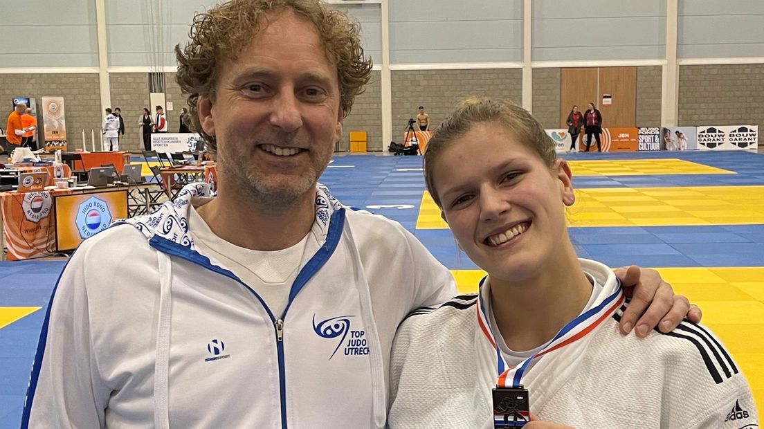 Esmé Scherrenberg met haar coach Marcel Houtzager