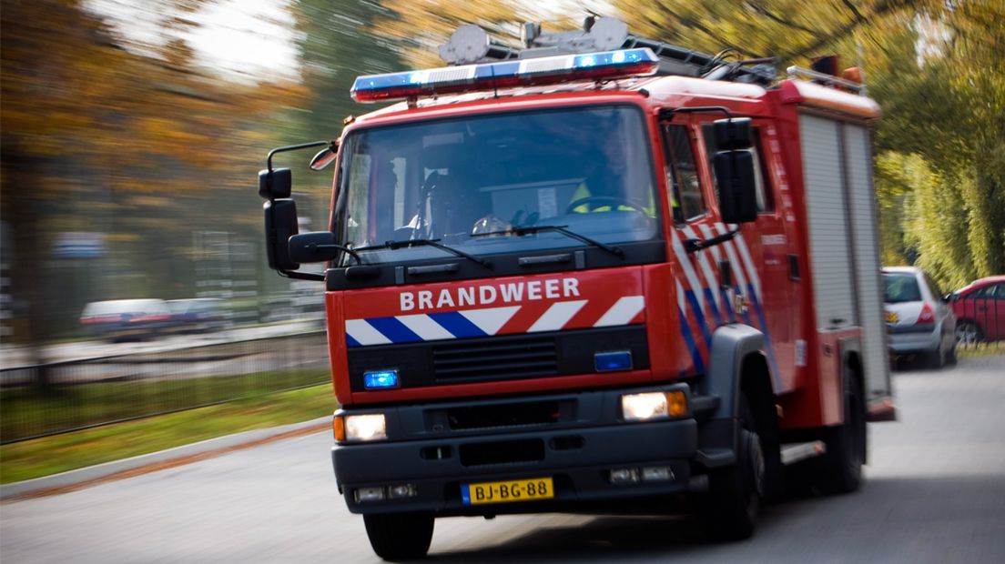 Brandweerauto onderweg naar incident