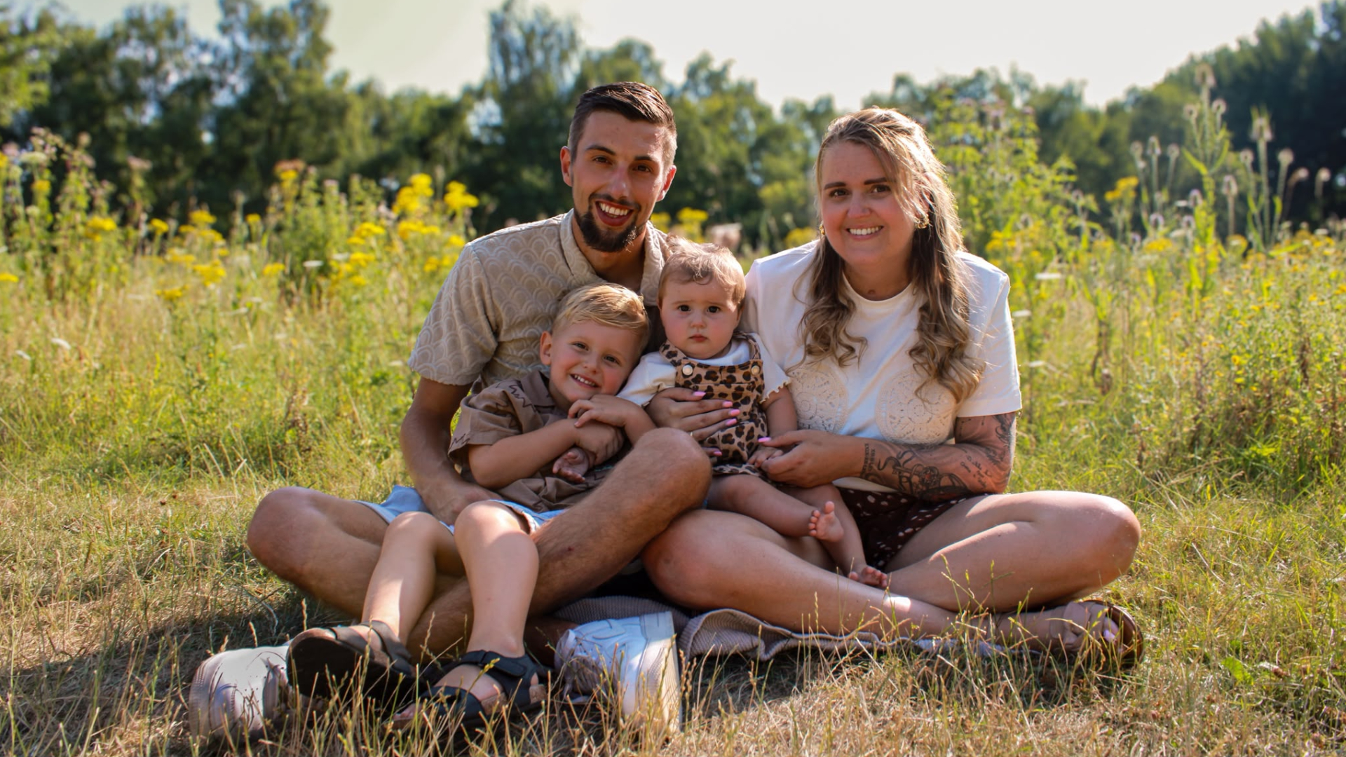 Priscilla met haar man en twee kinderen