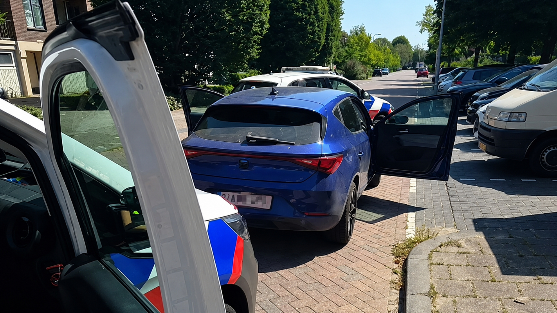 De Belg werd door twee politieauto's klemgereden.