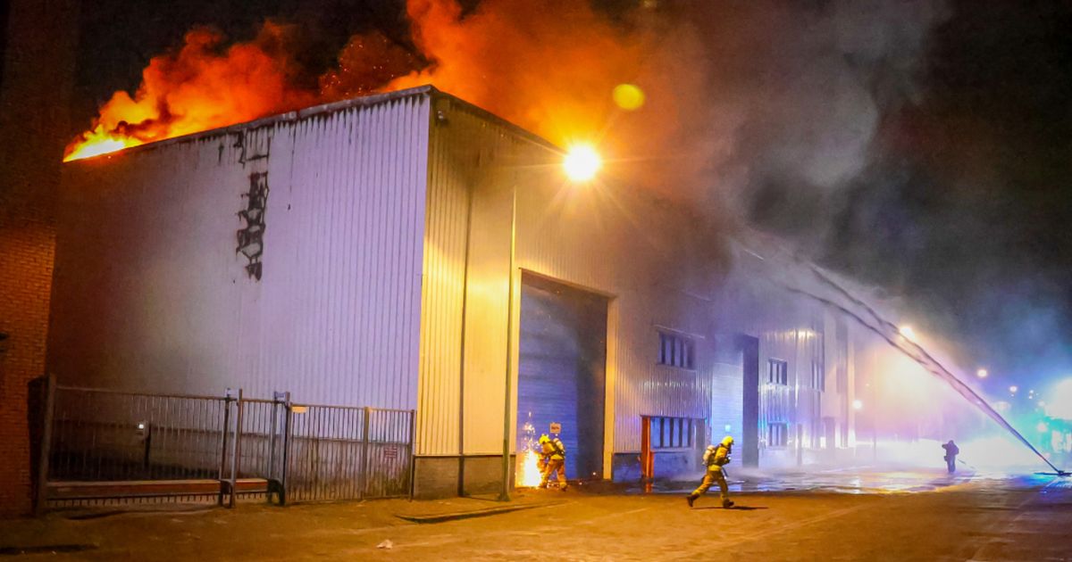 Large Fire in Loods, Flames from Roof – Rijnmond