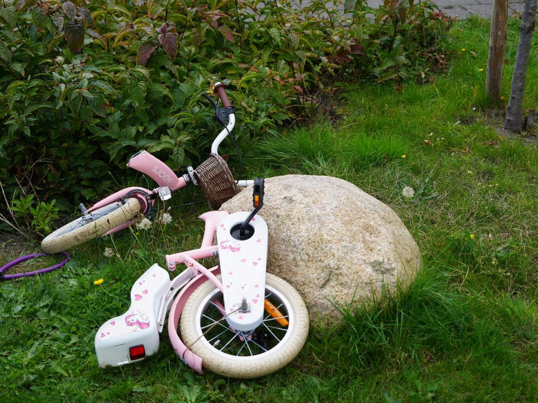 Het fietsje waar de voet in vast zat.