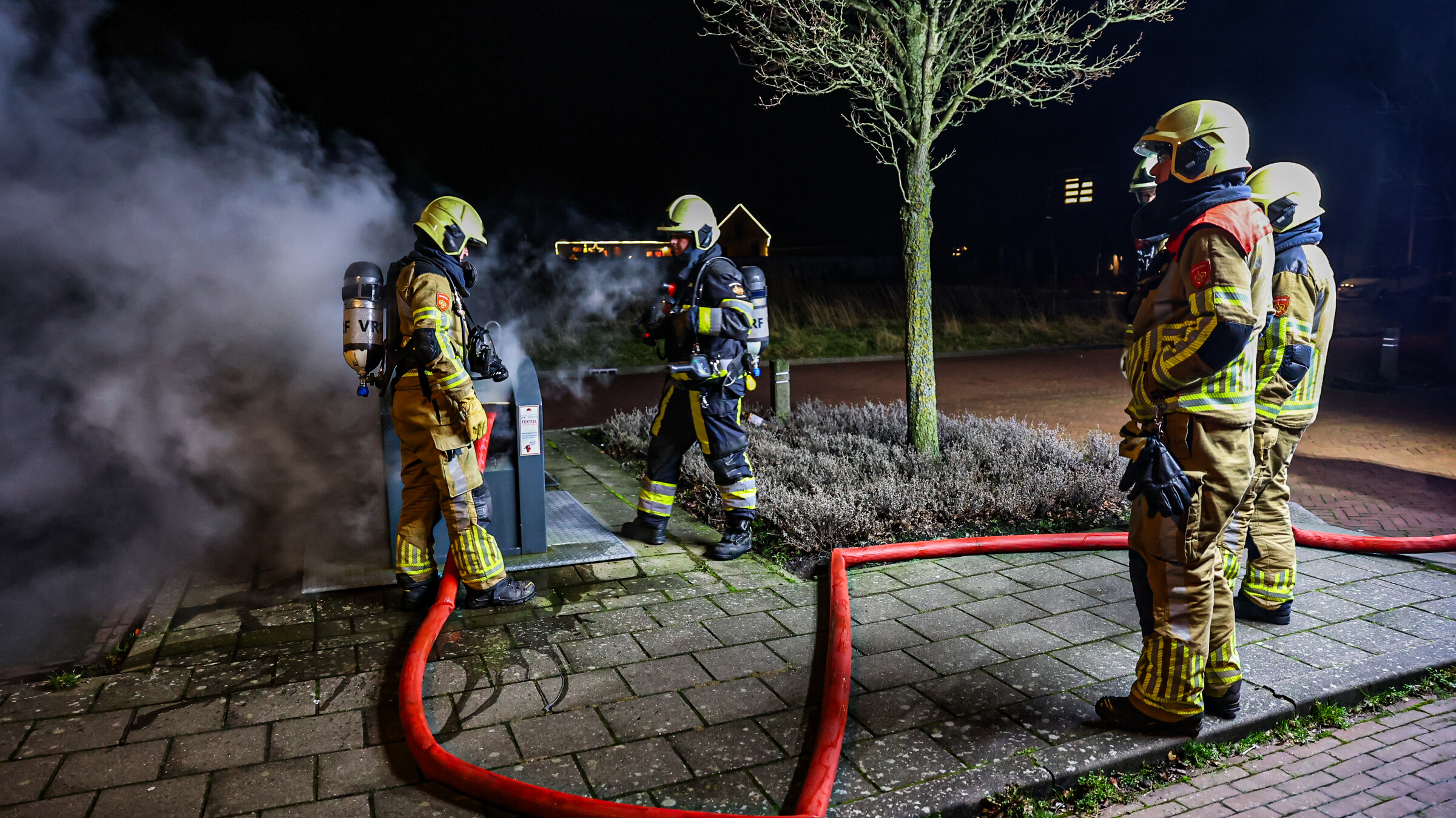 De brânwacht by de kontener
