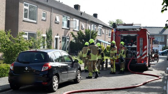 Flinke rookontwikkeling in woonwijk door brand in wasdroger