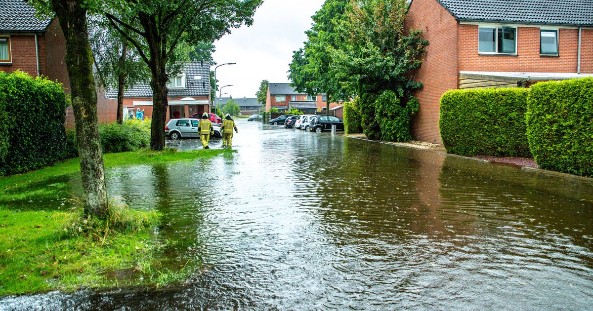 Heavy rain causes flooded streets in Drenthe