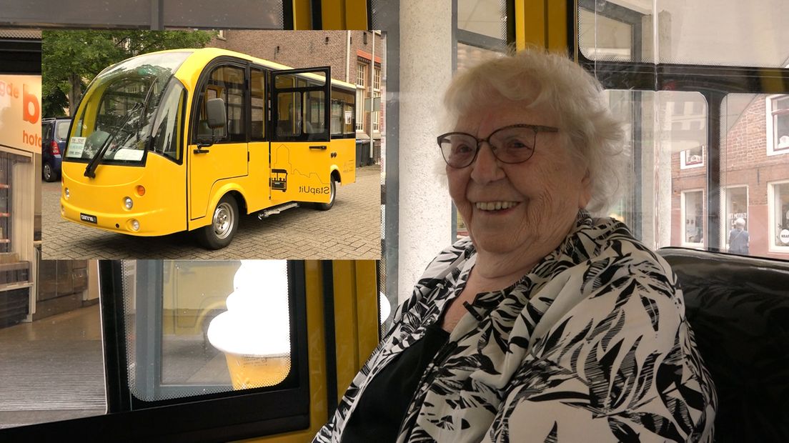 Mevrouw Simonis in het nieuwe busje.
