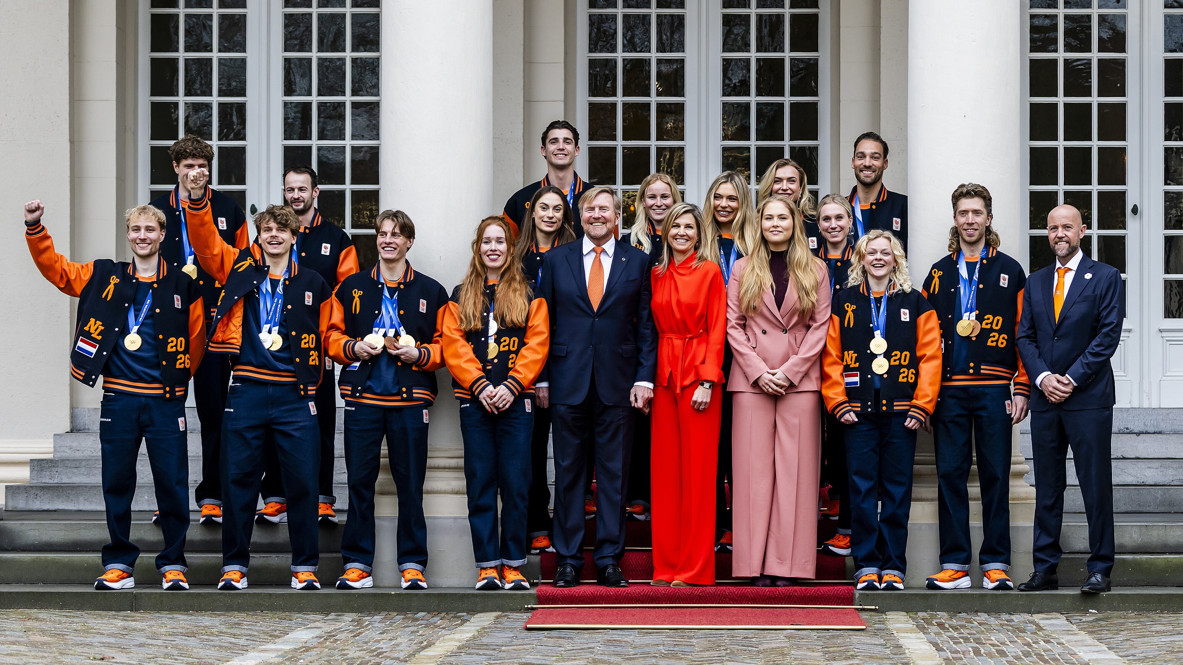 De medaljewinners by de keninklike famylje