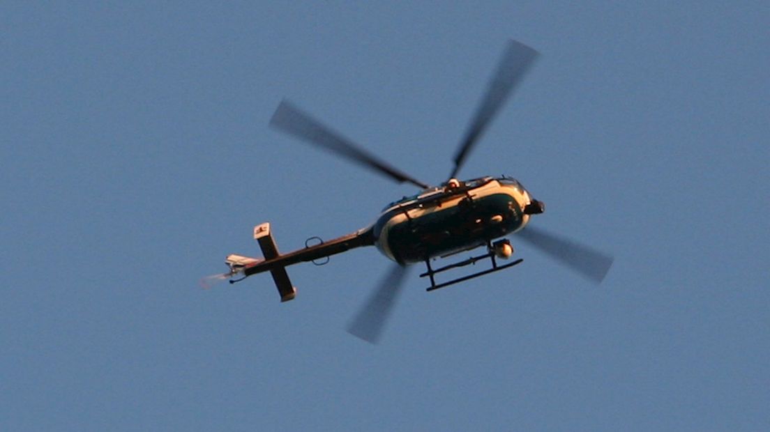 Politiehelikopter boven Wesselerbrink