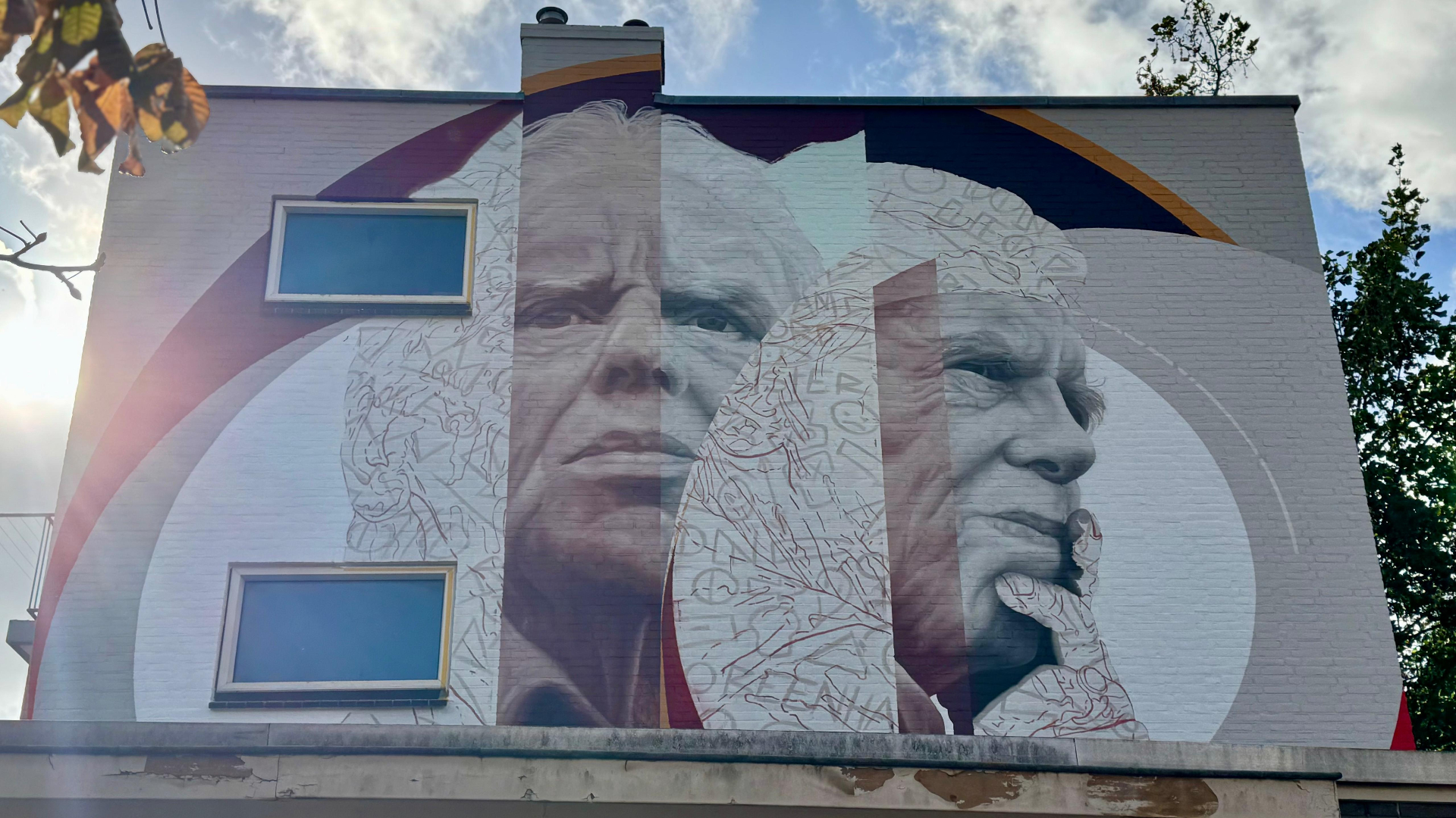 Muurschildering van Leo Beenhakker in Rotterdam-Zuid.