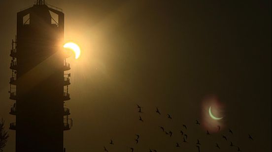 Zonsverduistering nog een keer zien? Bekijk hier de mooiste foto's van de eclips Home