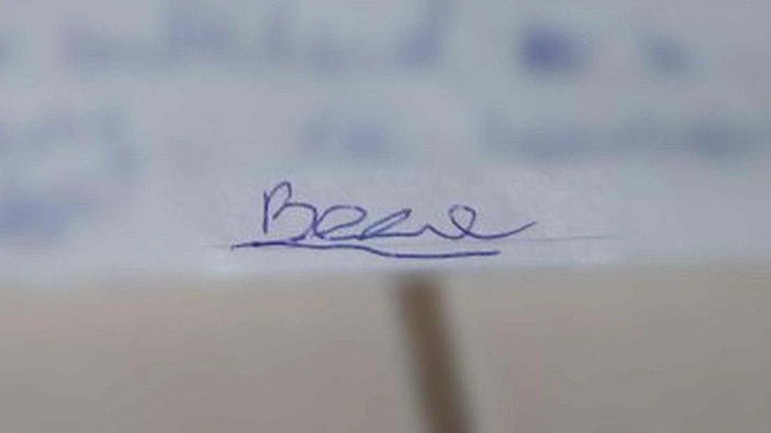 De ondertekening van het briefje