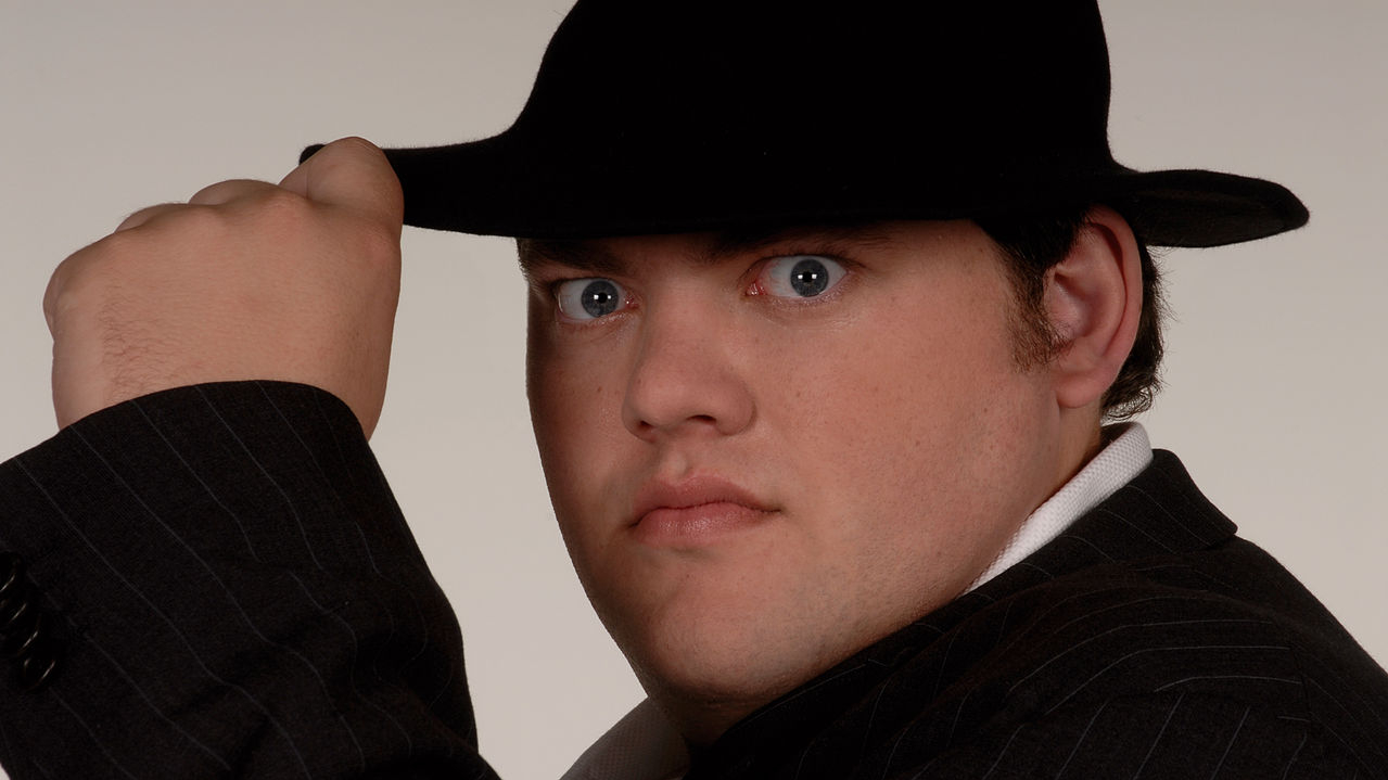 Persfoto van Jaap Amesz uit 2009, net na zijn winst in De Gouden Kooi