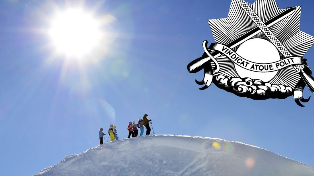 Wintersporters. Inzet: het logo van Vindicat.