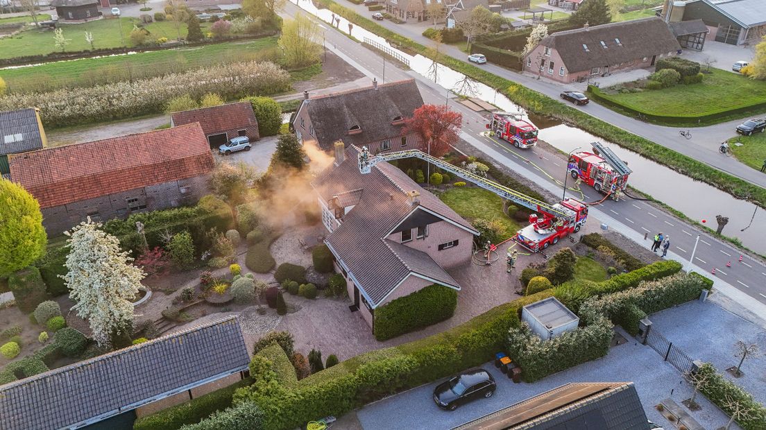 Small Fire in Benschopse Home, Police Warn Against Garden Scatters Firefighters at the scene of a house fire in Benschop