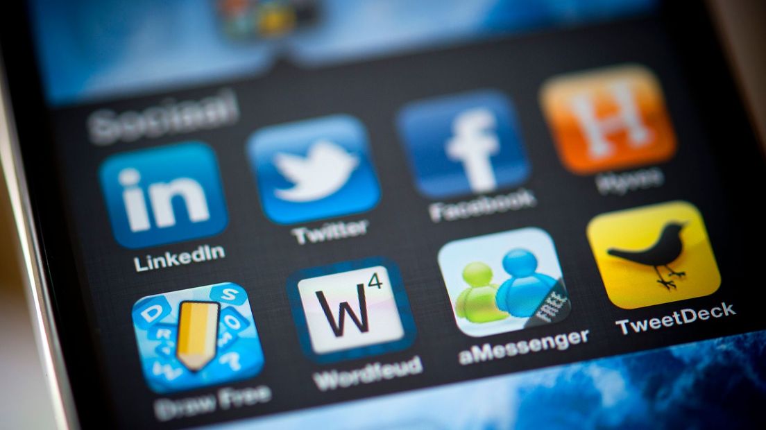 Even de sociale media bijhouden tijdens je werk? (Rechten: ANP XTRA / Lex van Lieshout)