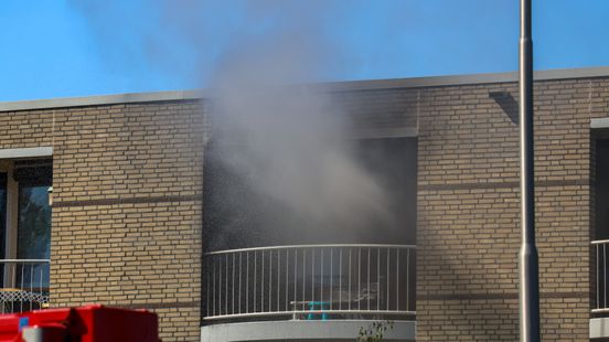 Appartement zwartgeblakerd na brand Home