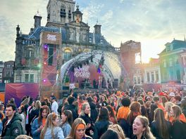 Oranje hoodies, rood-wit-blauwe schmink en bier: duizenden mensen genieten van Koningsnacht