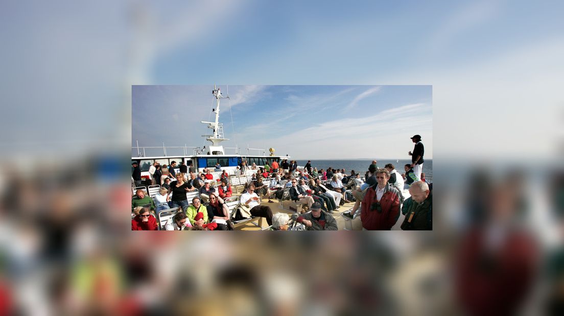 Toeristen op boat nei Flylân