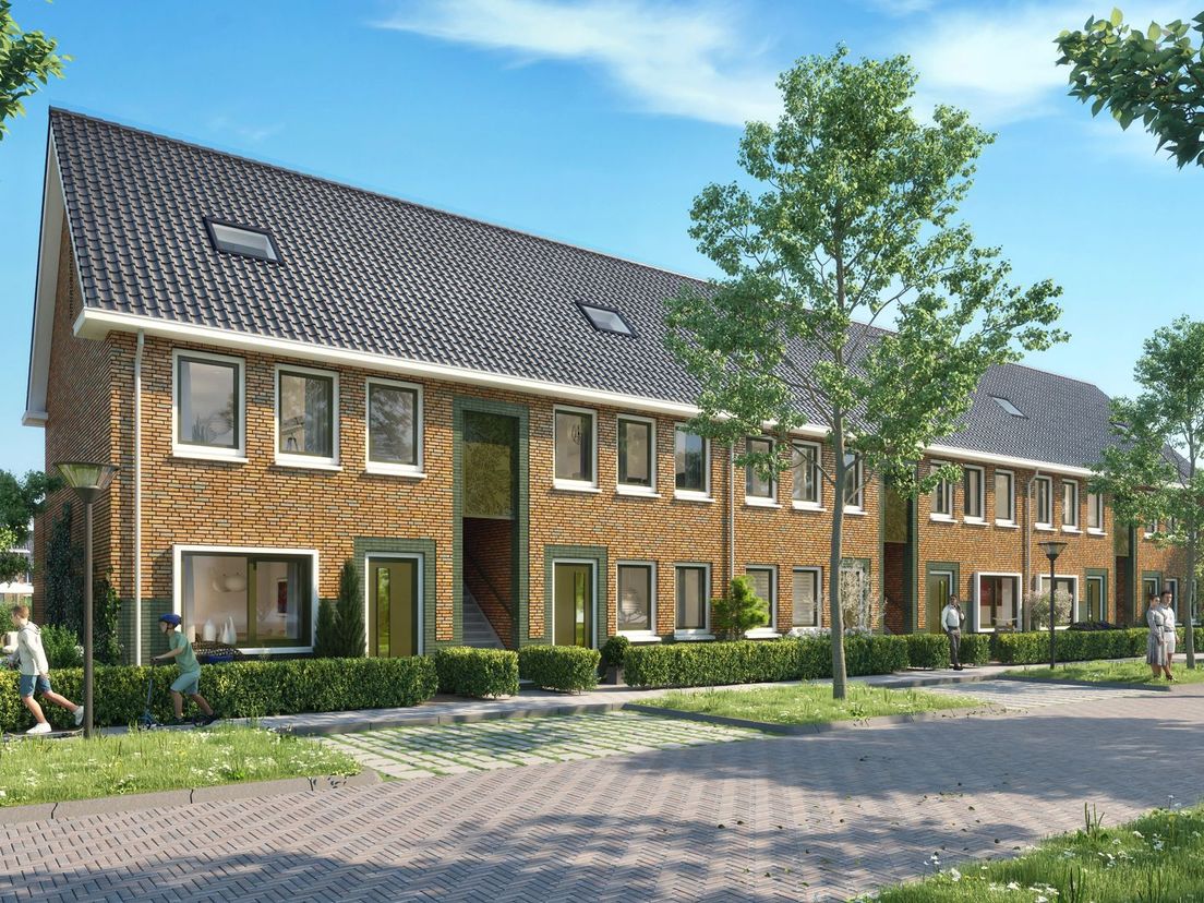 De boven- en benedenwoningen in een groene buurt