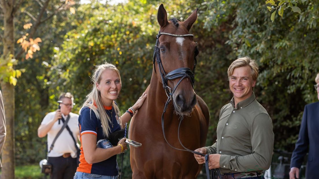 Jordy Wilken en zijn partner Inge de Wit, samen met Champ van 't Vhij.