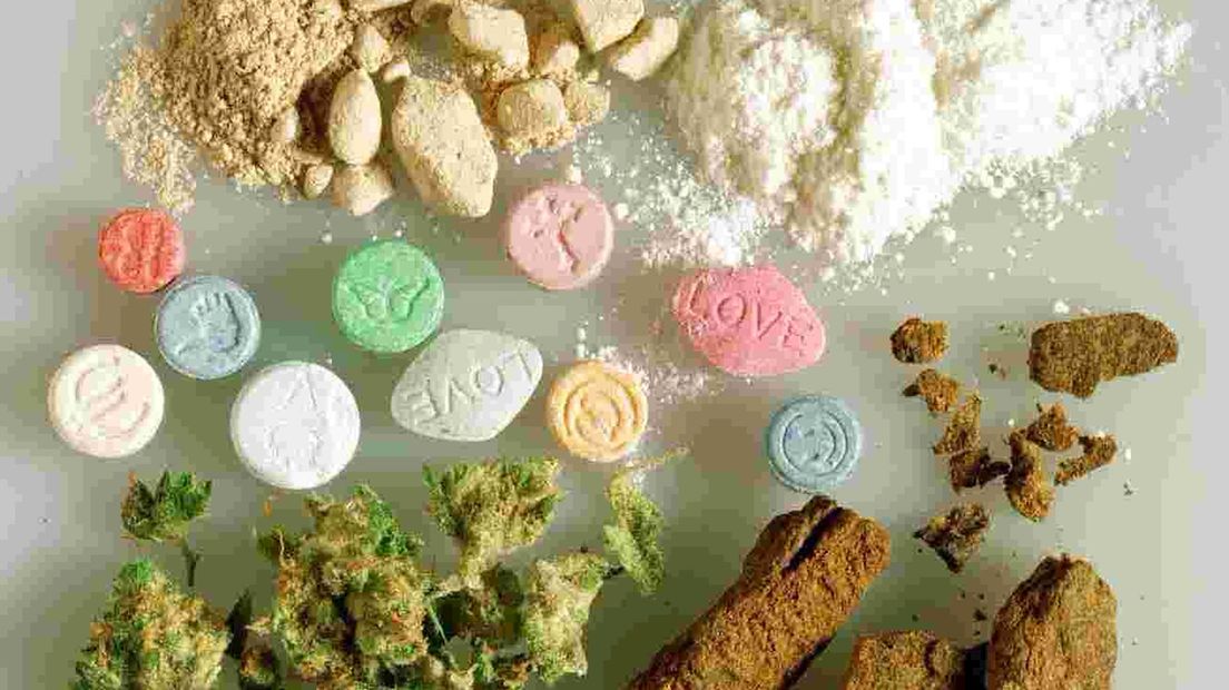 Wapens en drugs gevonden