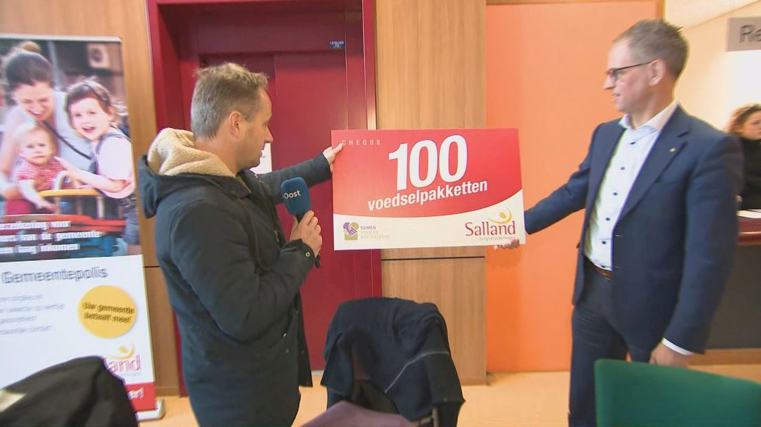 Overhandiging van de cheque