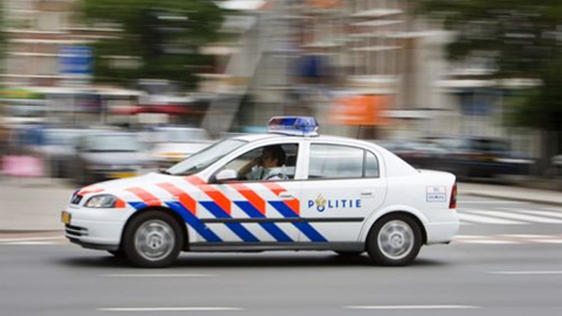 Politie in politieauto