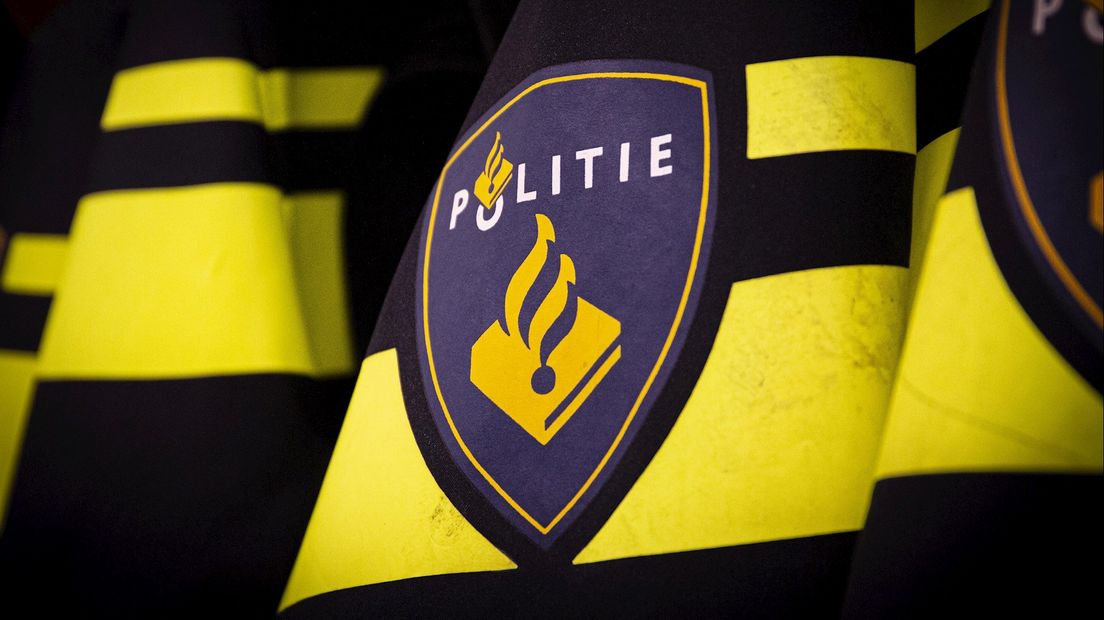 Politie logo op jas