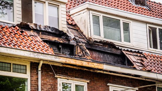 Foto: Huizen beschadigd door brand • vrouw mishandeld
