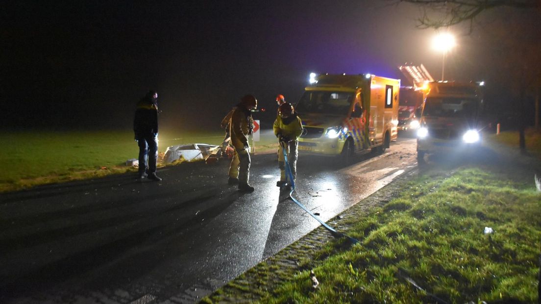 Brandweerlieden op de plaats van het ongeval