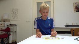 Kinderen kleuren tekeningen in om pesten te voorkomen