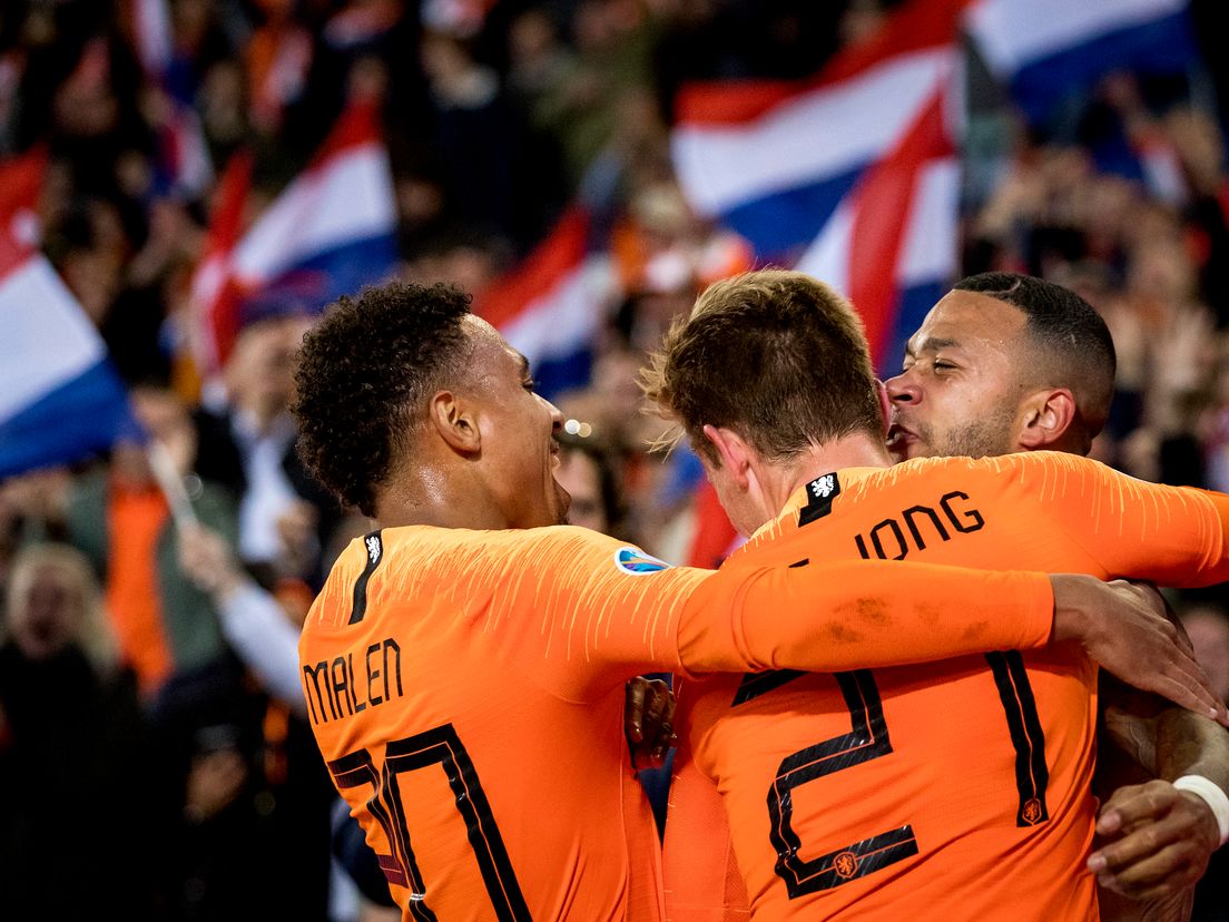 Oranje viert de overwinning. Foto Koen van Weel (ANP)