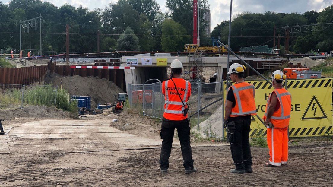 Werklieden bij de Helperzoomtunnel