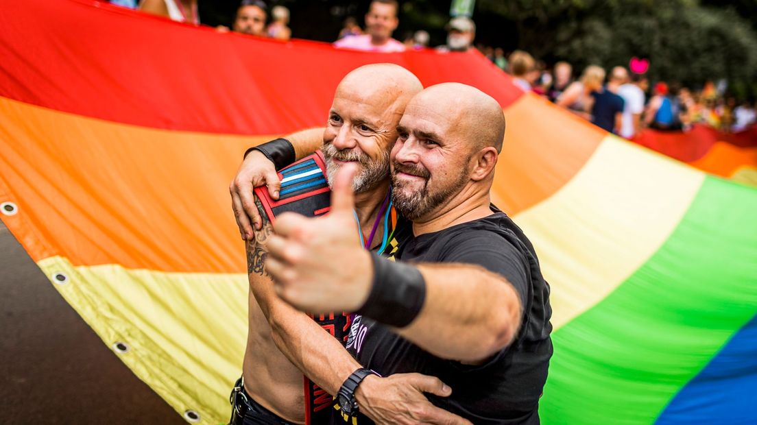 Het Regenboogsymposium moet organisaties en bedrijven meer kennis geven over mensen met een LHTBI-identiteit (Rechten: ANP/Remko de Waal)