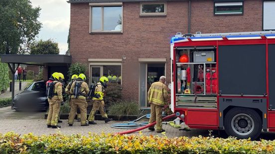 Rook uit woning door kortsluiting: brandweer rukt uit