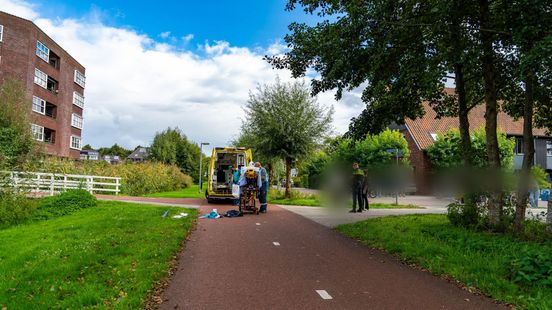 Fietser gewond na ongeval, scooterrijder rijdt door. Fietser gewond na ongeval, scooterrijder rijdt door.