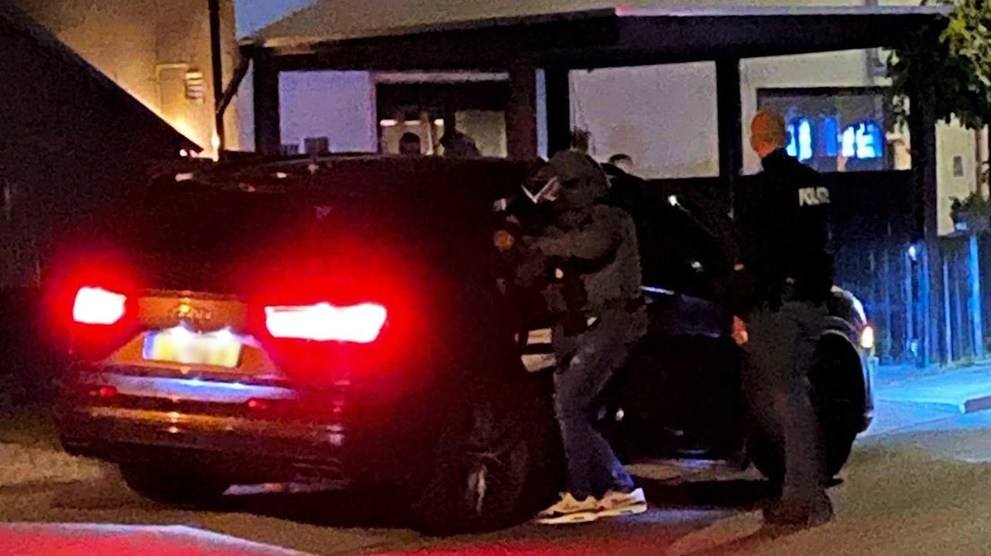 Politie bij de woning.