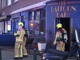 Woningen ontruimd en twee katten gered bij brand in ballonwinkel op Scheveningen