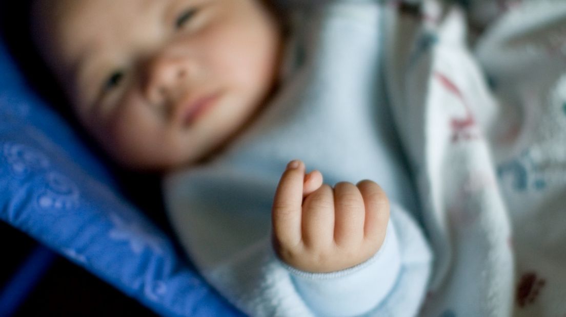 Baby in de wieg