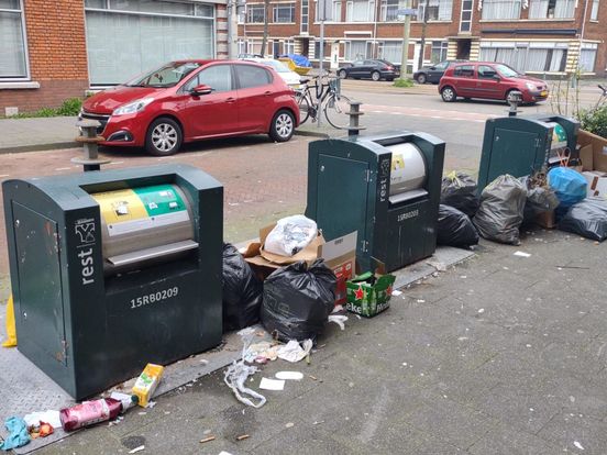 'Minder vuilniszakken naast afvalcontainers door camerabewaking'