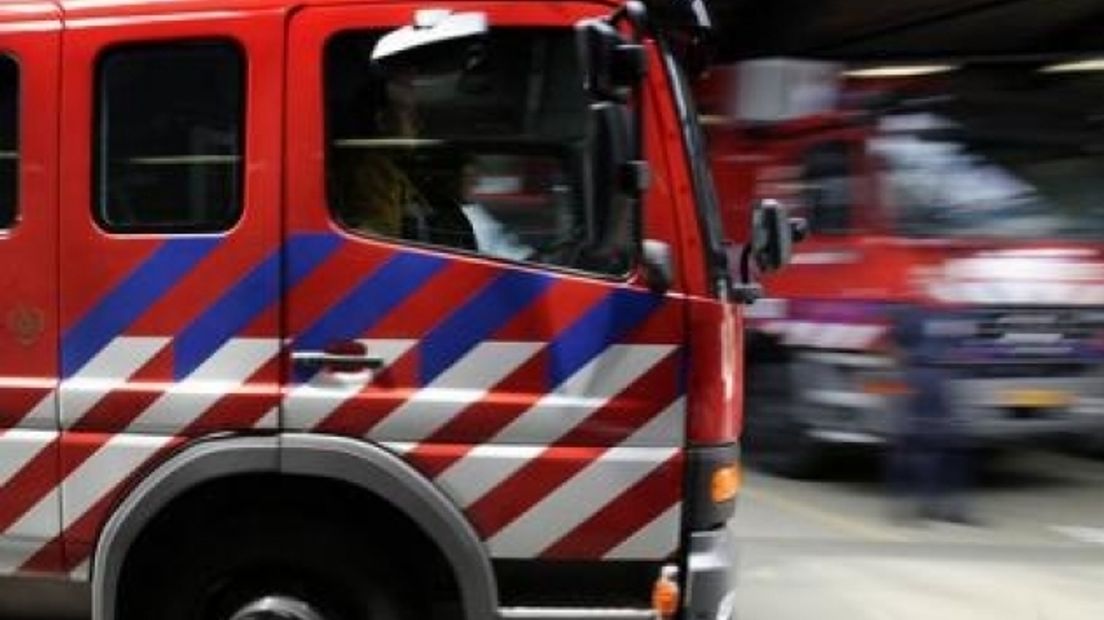 Uitrukkende brandweerwagen