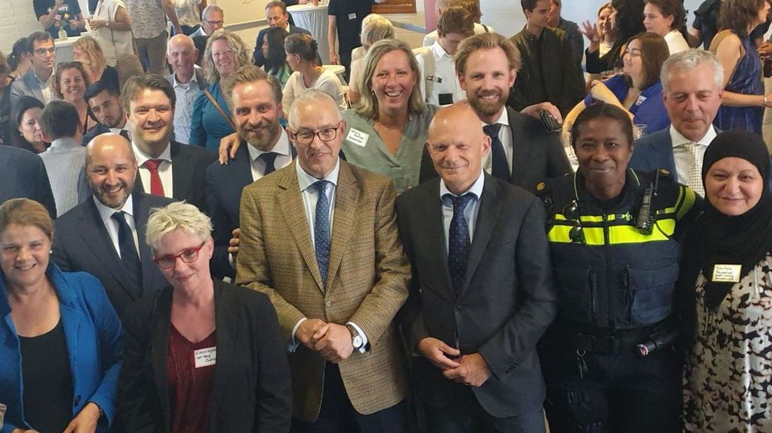 Marcouch met een aantal van de betrokken bewindspersonen.