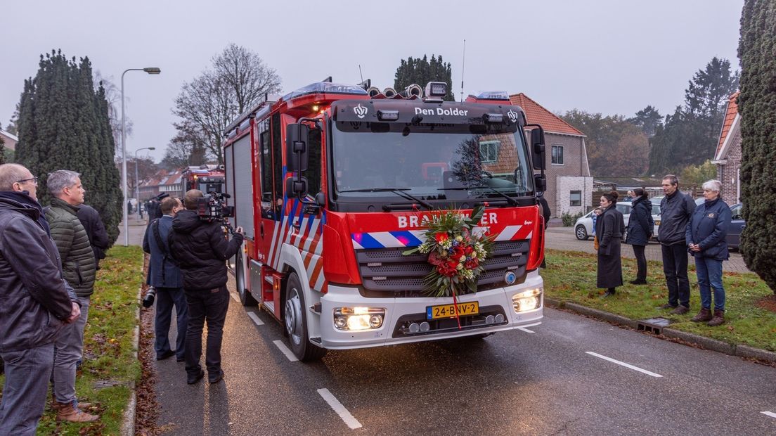 Collega's vormden een erehaag.